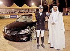 Abdullah Waleed Al-Sharbatly, winner of the Equestrian Championship, with the Toyota Aurion