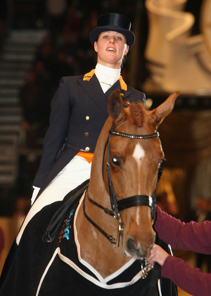 Adelinde Cornelissen of the Netherlands is seen on Parzival after winning the FEI World Cup Dressage