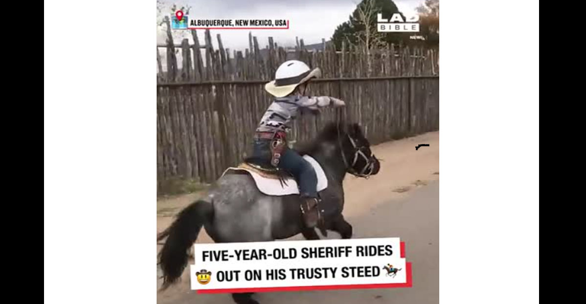 Five year old sheriff rides into town on his trusty steed
