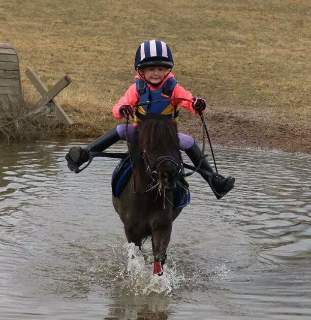 little girl riding