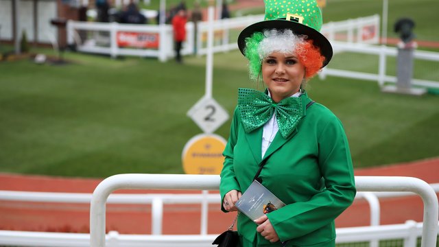 Race goers dress up for St Patricks day at Cheltenham races