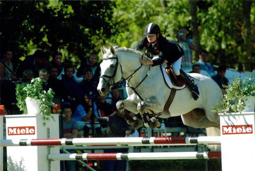 Emma Shaw & show jumping stallion Crown Rhodonite